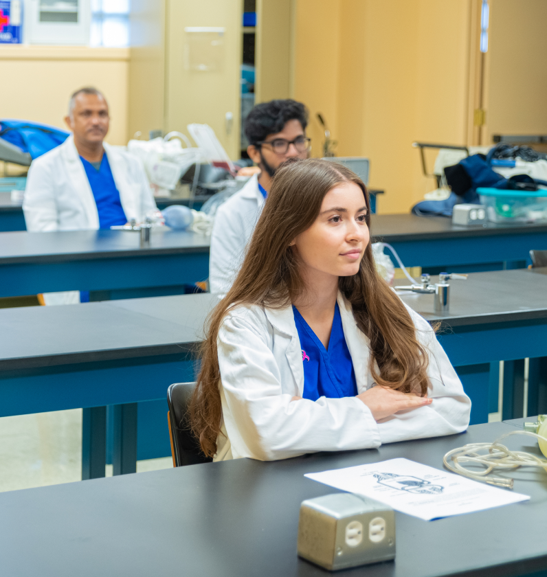 Medical students listening to a teacher.