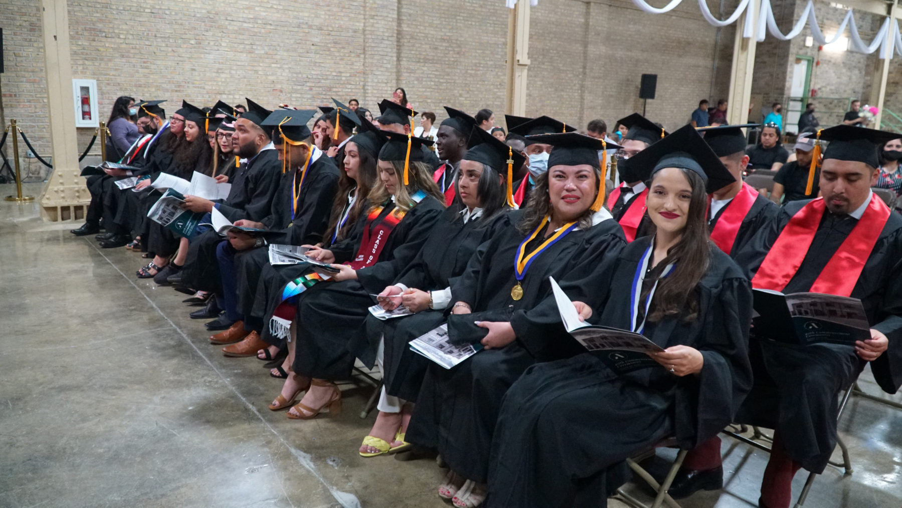 Students waiting to be handed their degree.