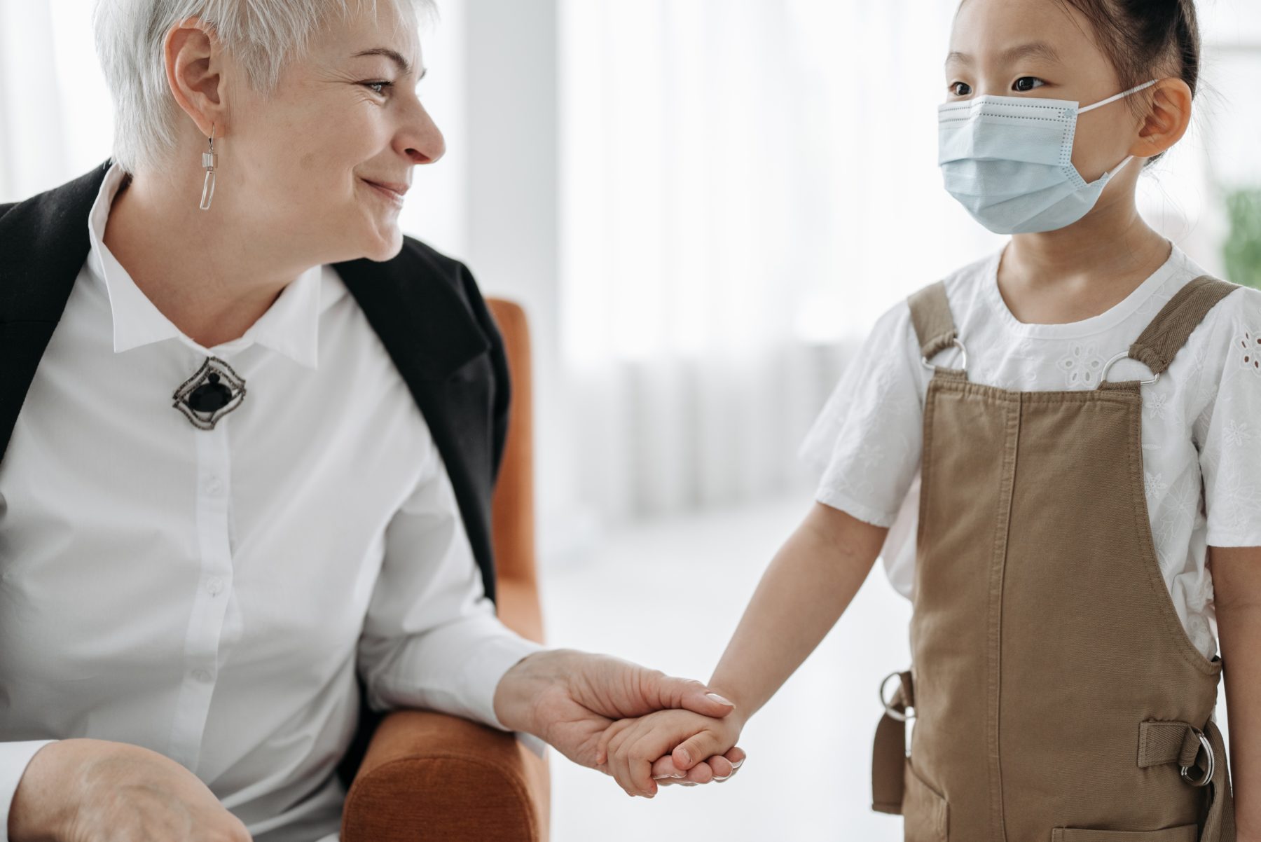 Social Worker and child talking.