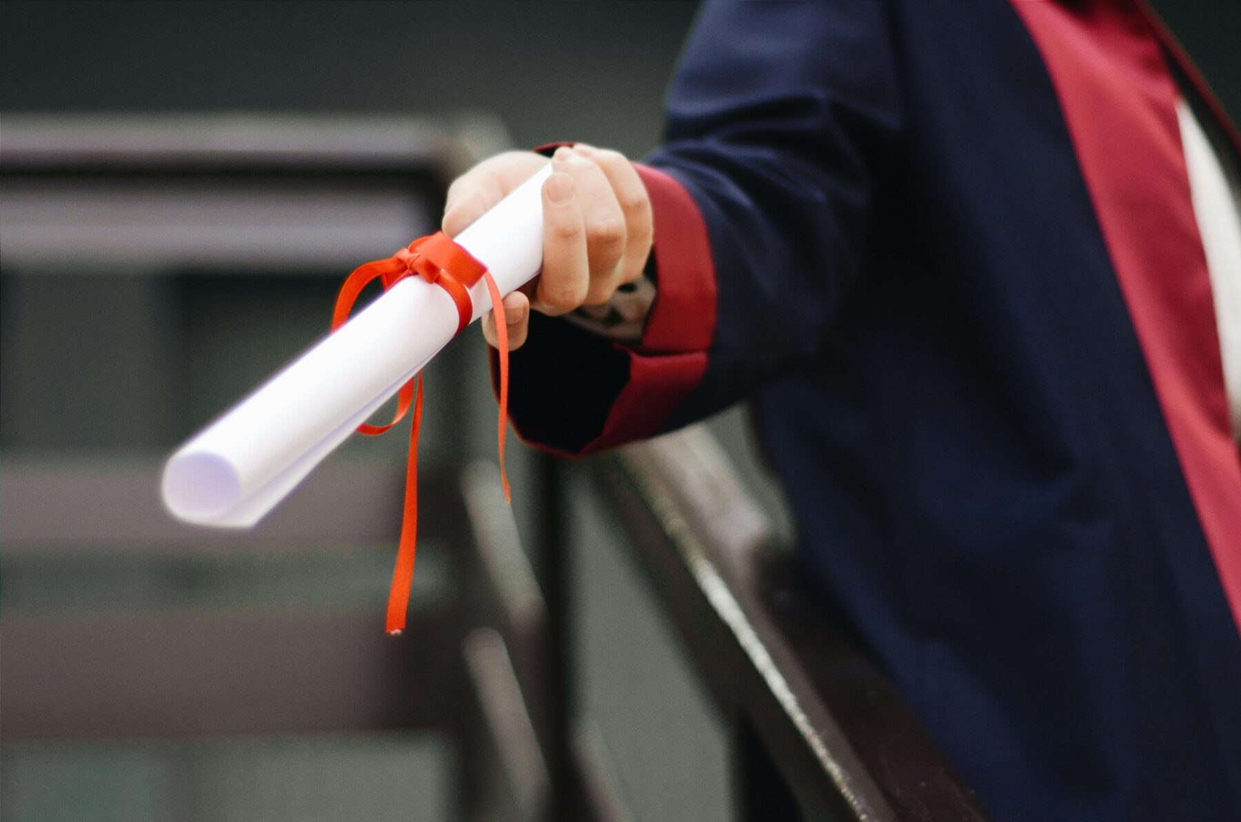 A college graduate receiving their diploma.