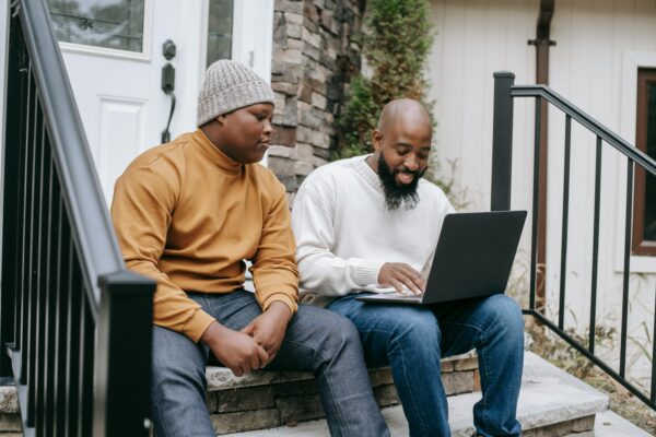 A social worker helping a client access resources.
