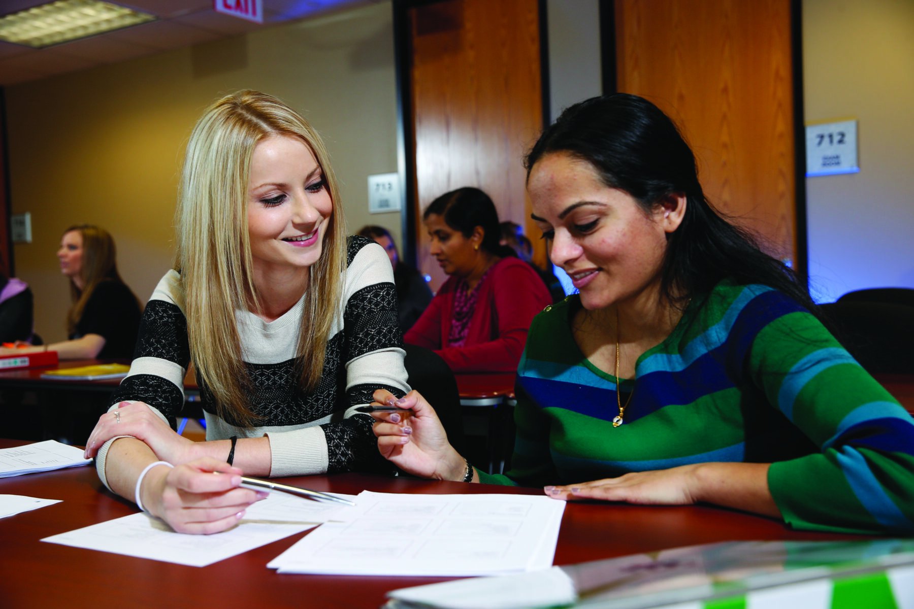 Two girls studying at Lewis University.